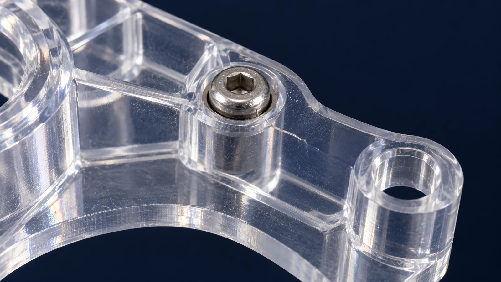 Cracked polymer around fastener